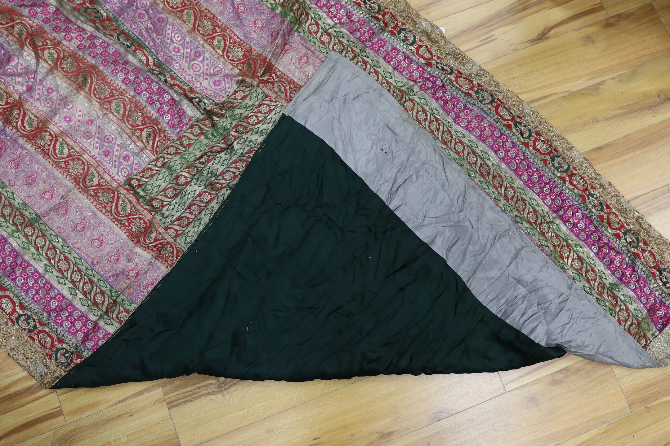 A French 18th century woolwork cushion, 2 chair covers, another panel, a tasselled brocade cushion and an Indian metallic brocaded patchworked cover